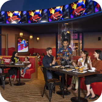 family having dinner in a planet hollywood restaurant